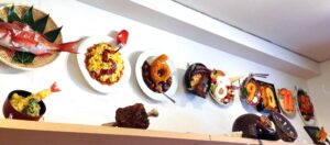 Unique food samples with numbers on the wall