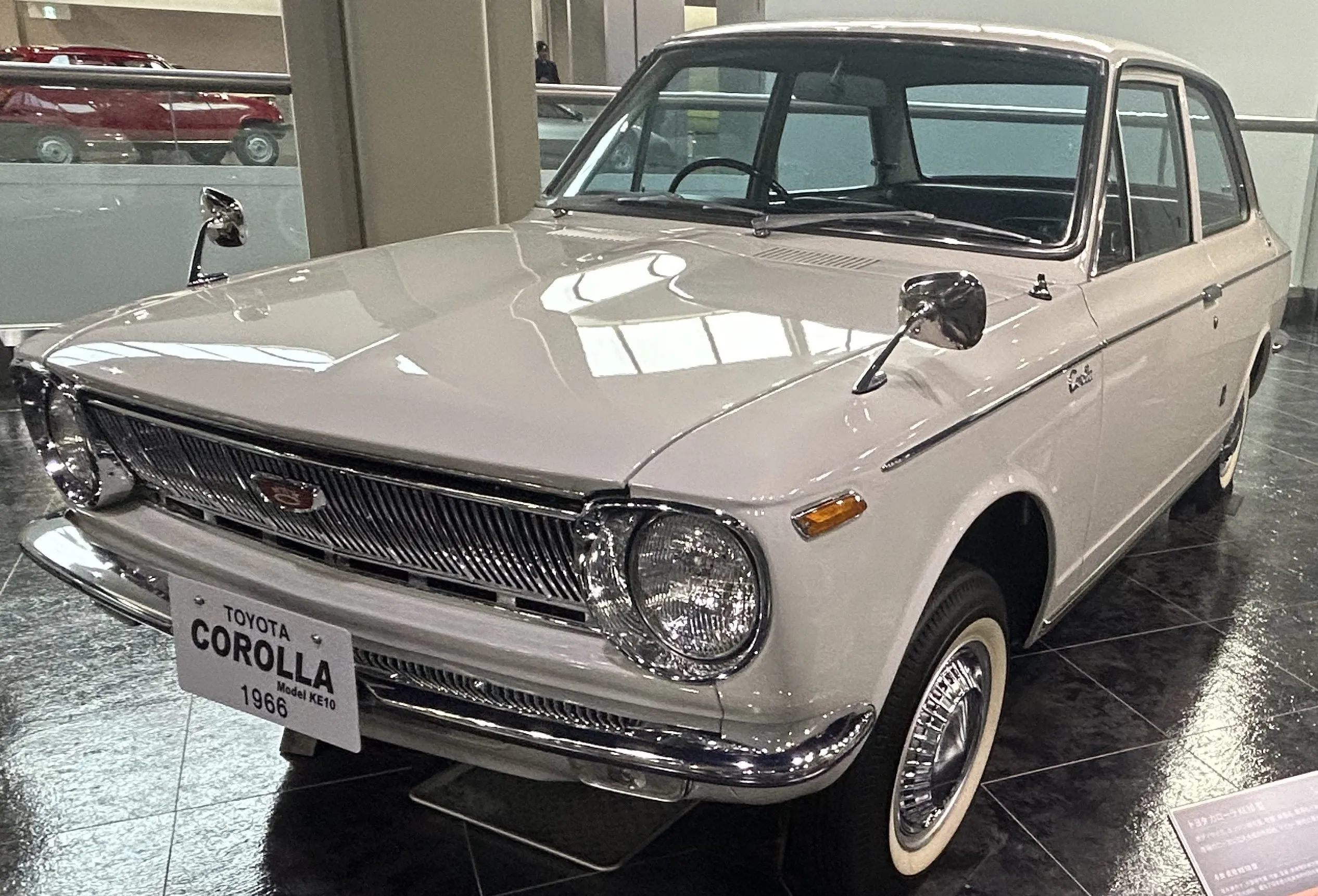 A photo of white TOYOTA COROLLA 1966 at TOYOTA MUSEUM